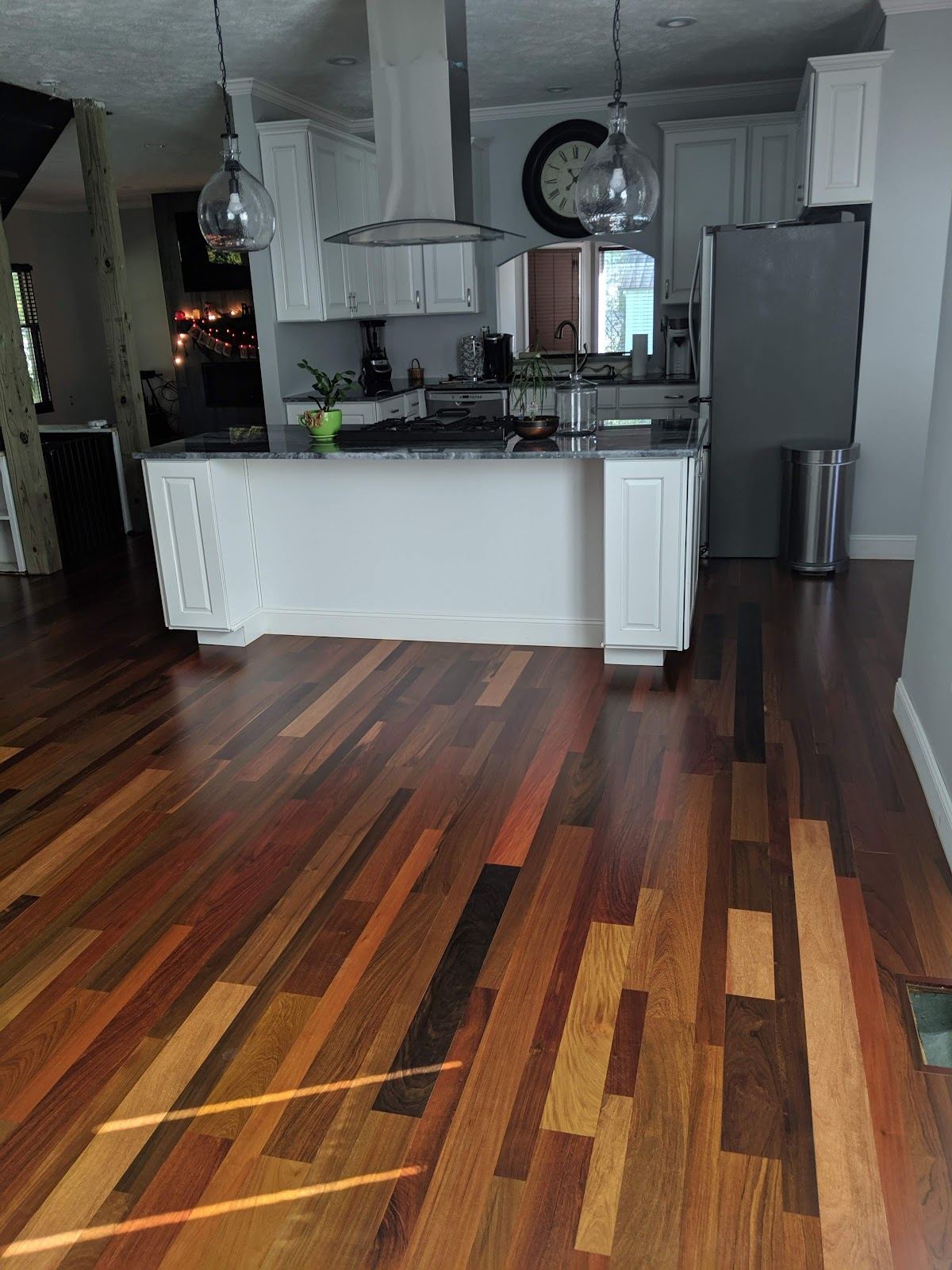 Mixed-tone hardwood floor in kitchen