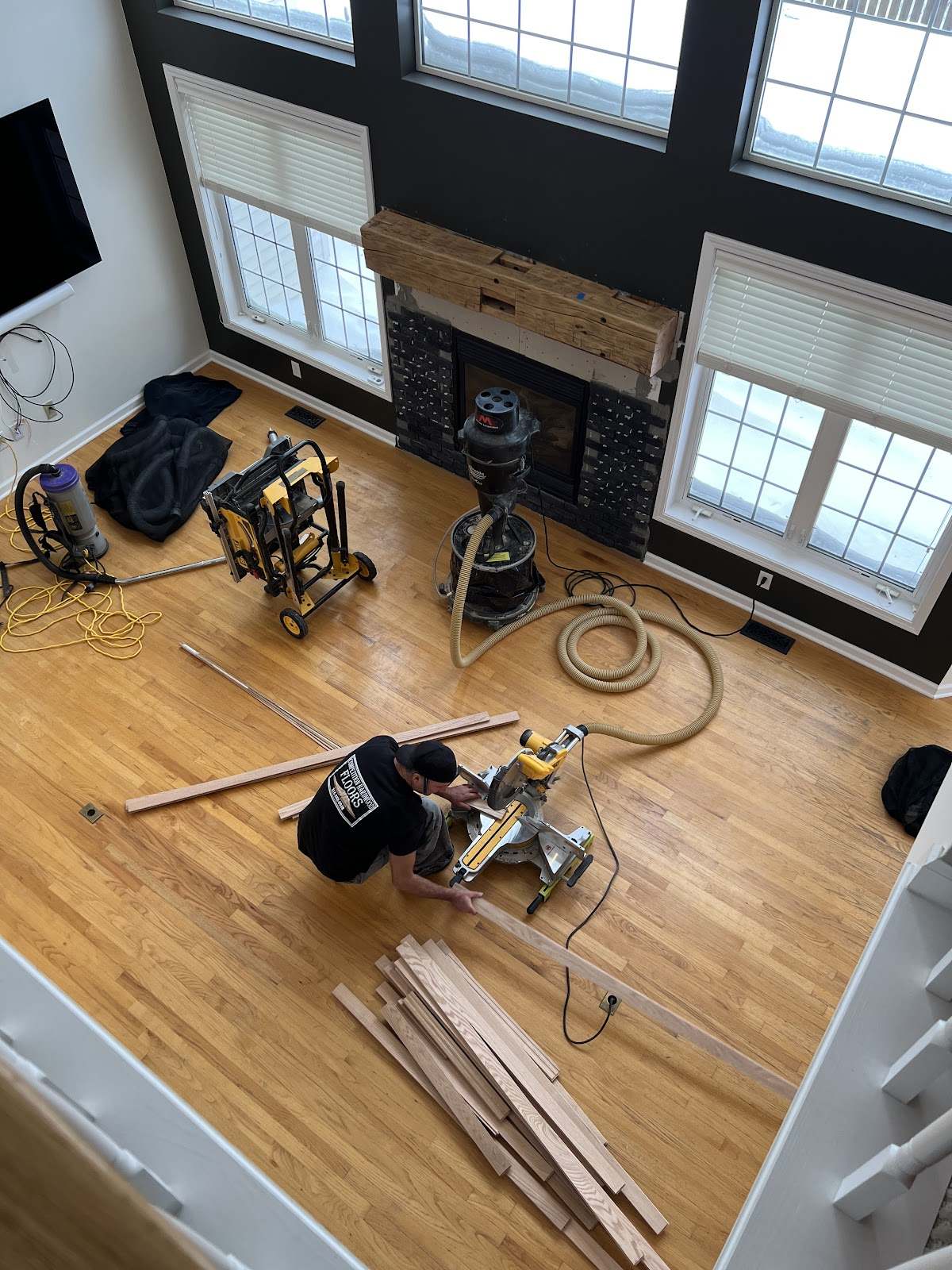 Hardwood installation in progress in a great room